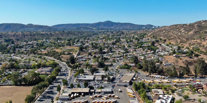Scenic view of Poway, California featuring a gate and garage door